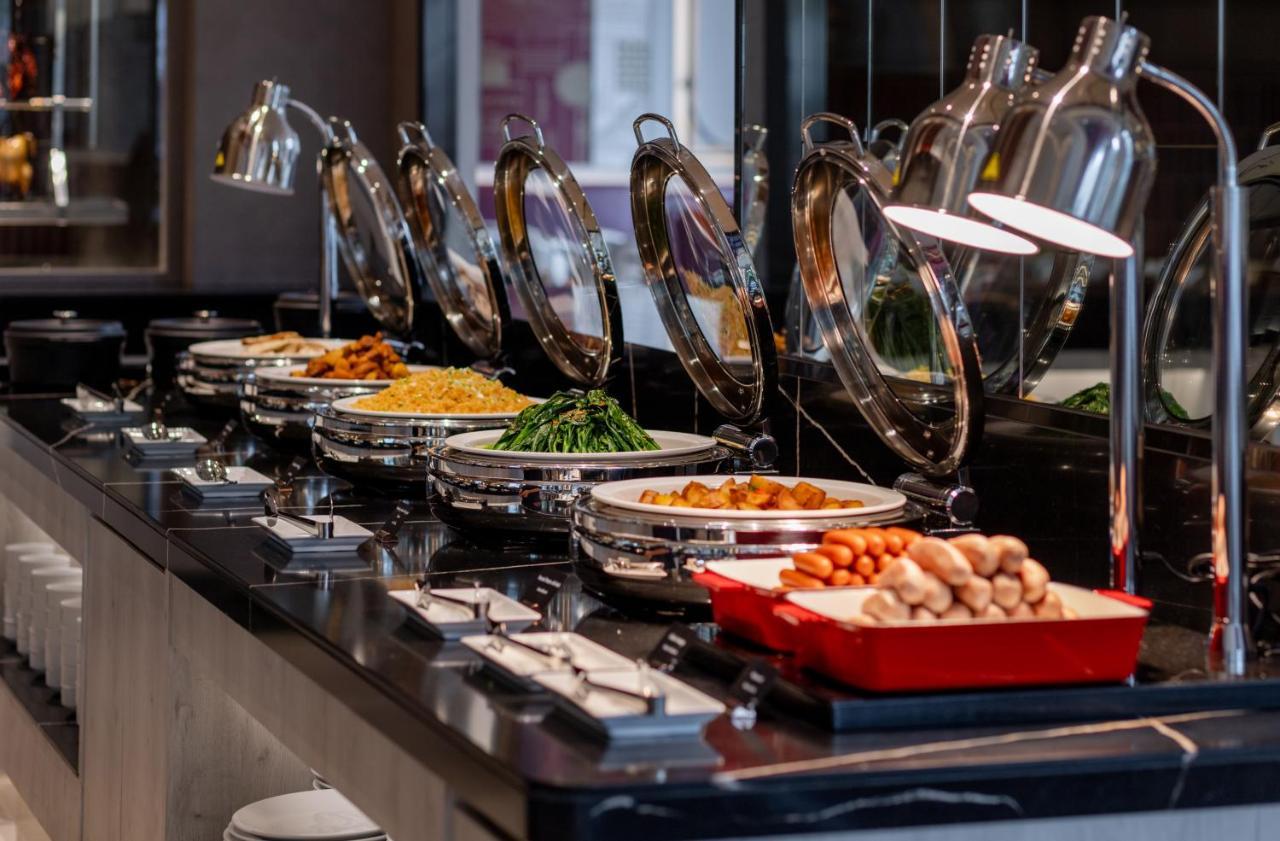 Grande Centre Point Surawong Bangkok Hotel Exterior photo A buffet at a hotel